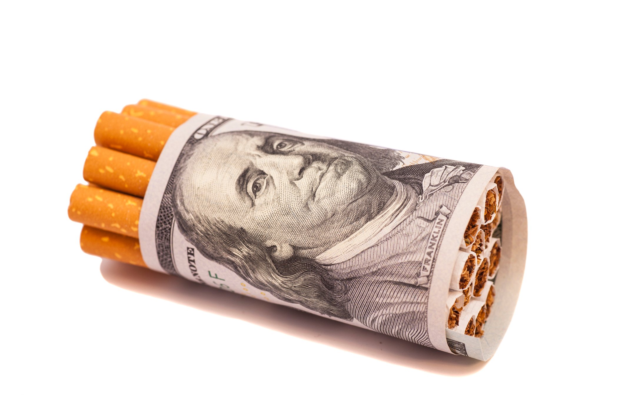Cigarettes wrapped in dollar bill