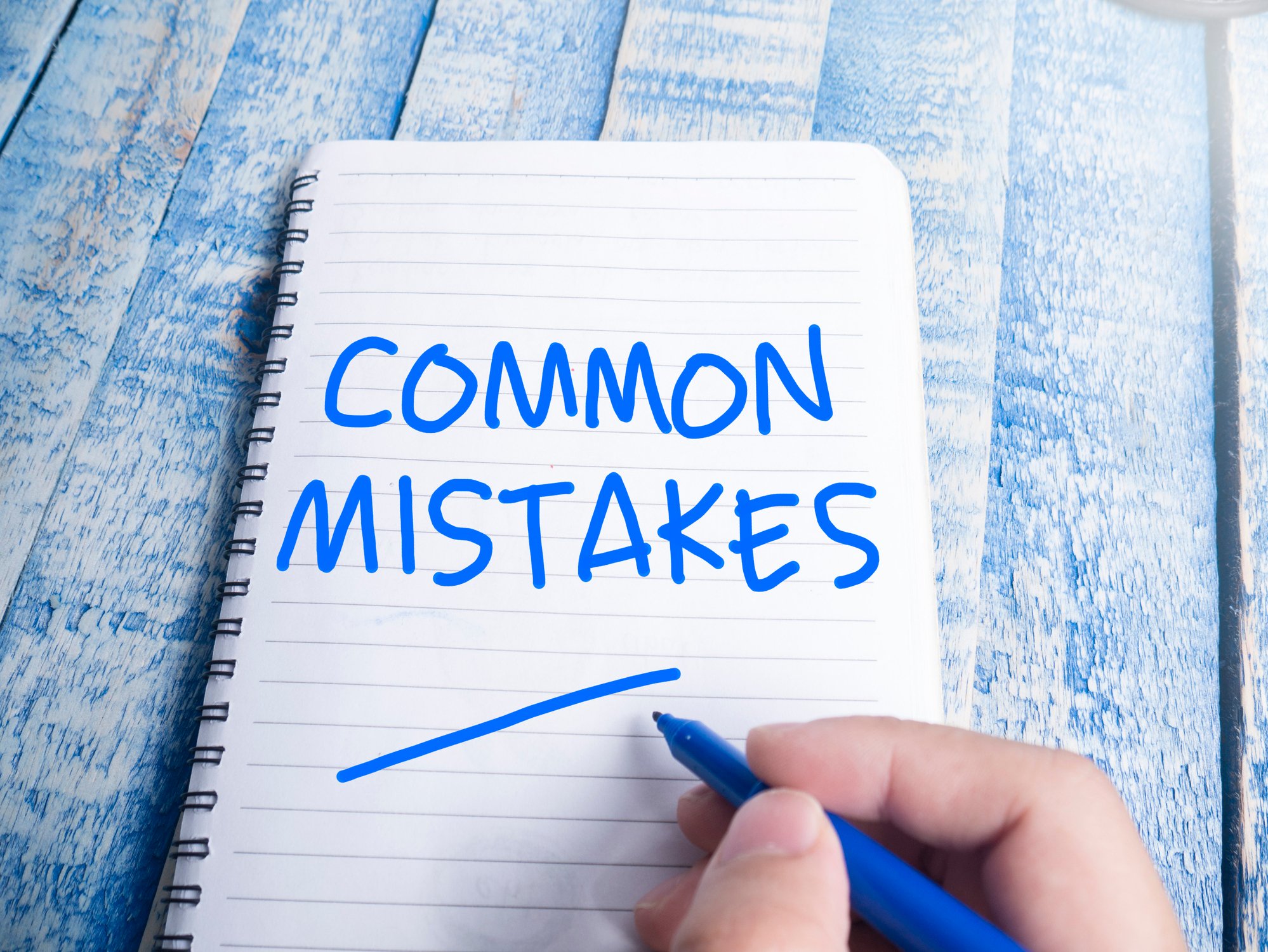 Words Common Mistakes written on a notepad