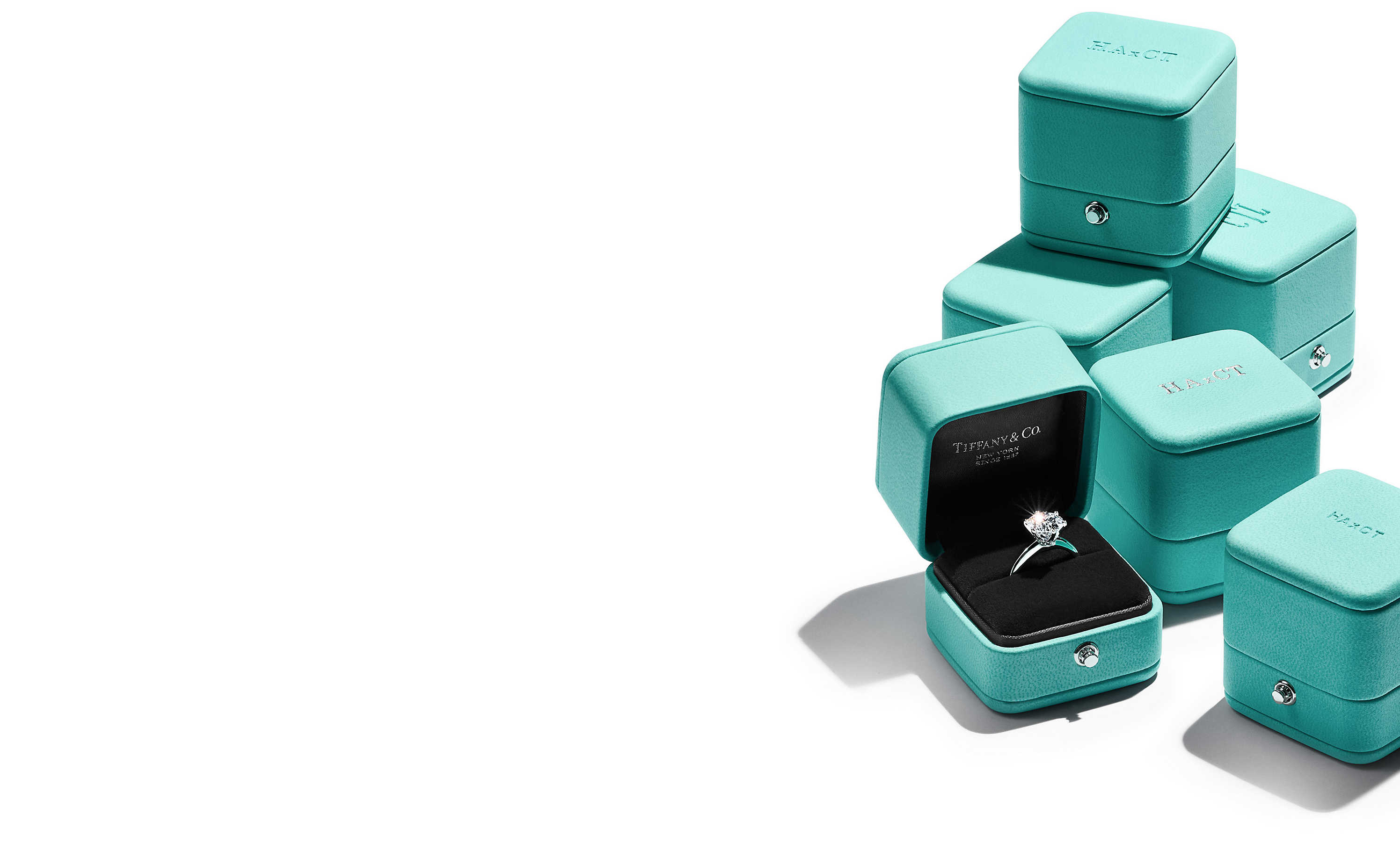 Tiffany blue jewelry boxes and diamond ring