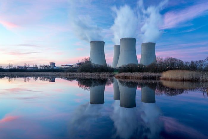 A nuclear power plant at dusk.