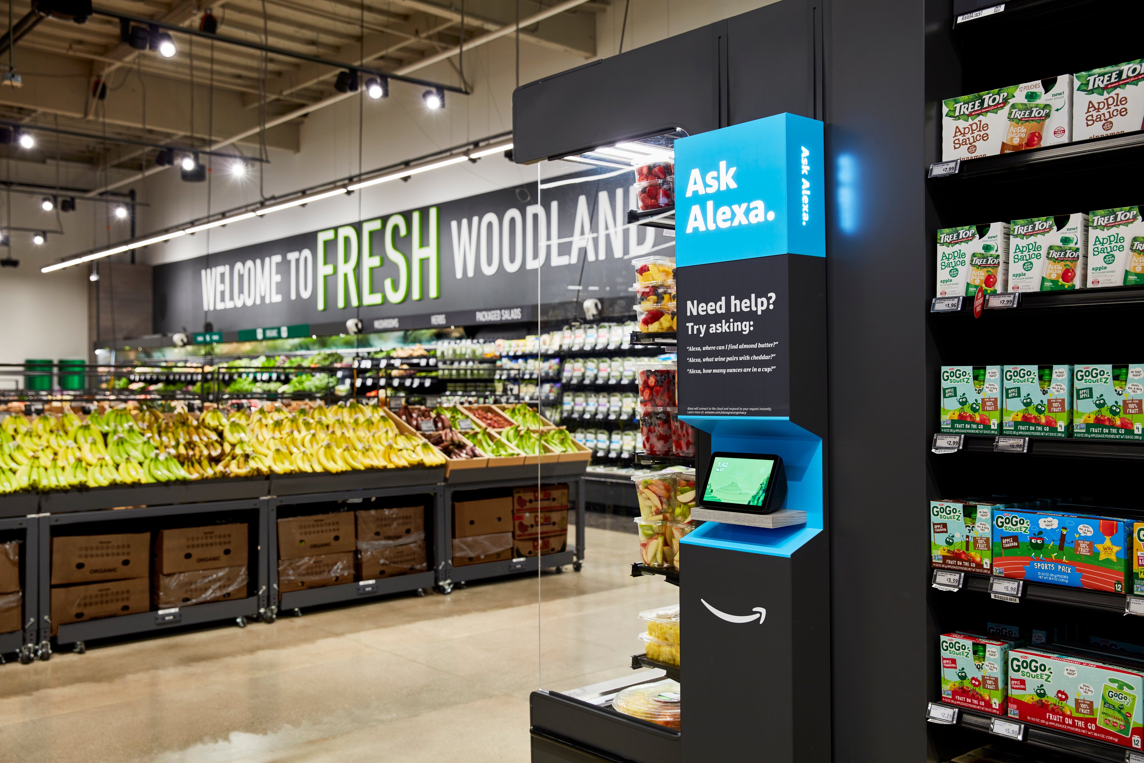 An ask Alexa station at Amazon's new Amazon fresh grocery store aisle. 