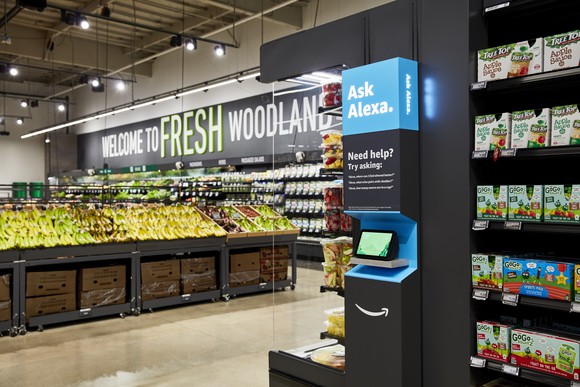 An ask Alexa station at Amazon's new Amazon fresh grocery store aisle. 