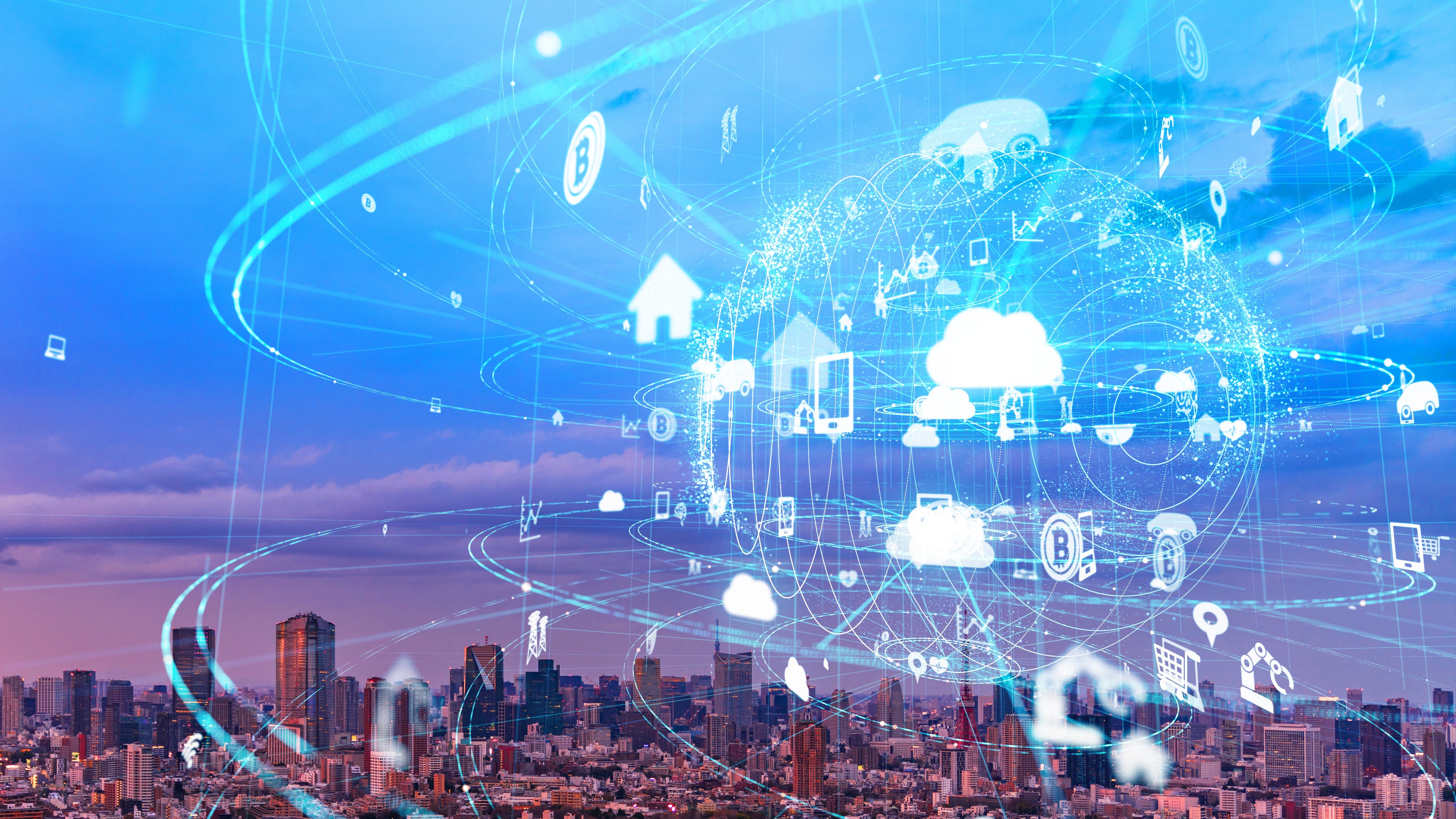 Digital transformation concept showing a variety of internet symbols and networks against a city backdrop.