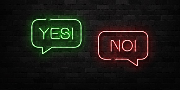 Neon signs of Yes and No.
