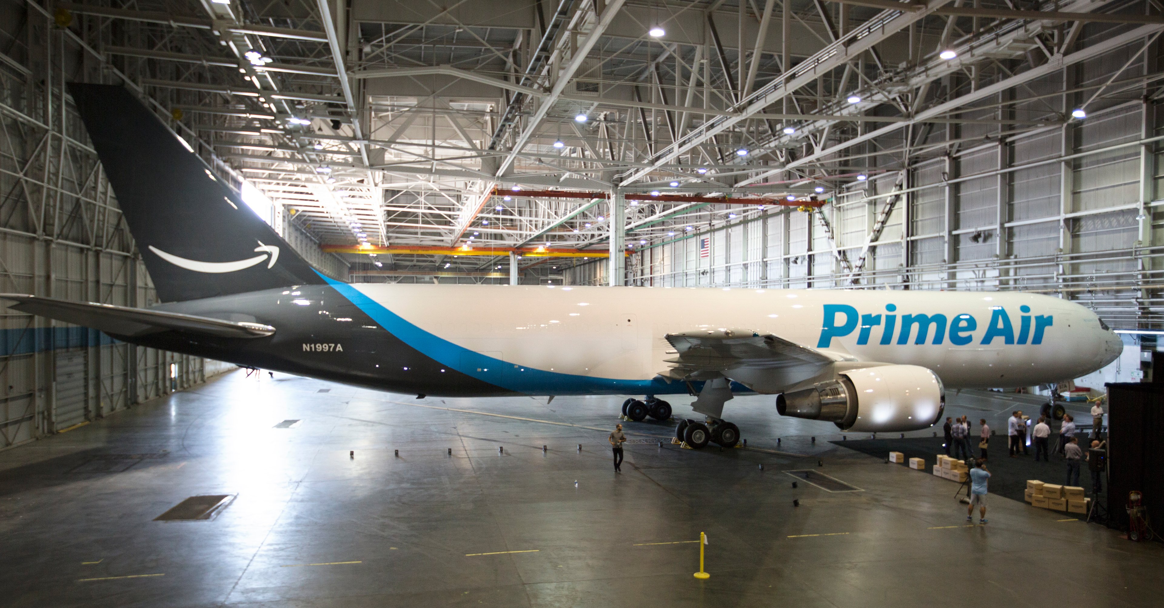 An Amazon Prime Air jet inside an airplane hangar.