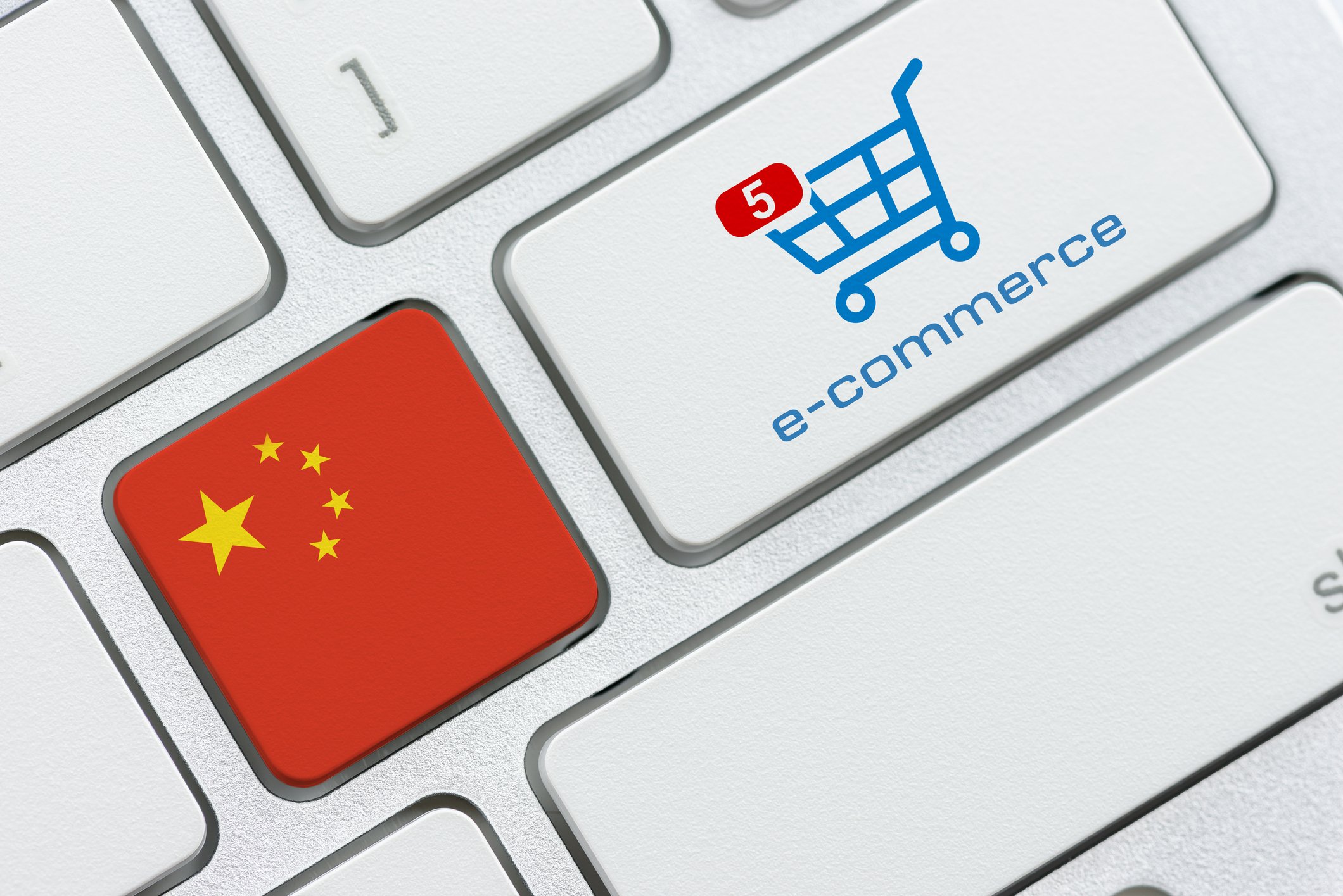 China flag on keyboard right next to key with e-commerce shopping cart.