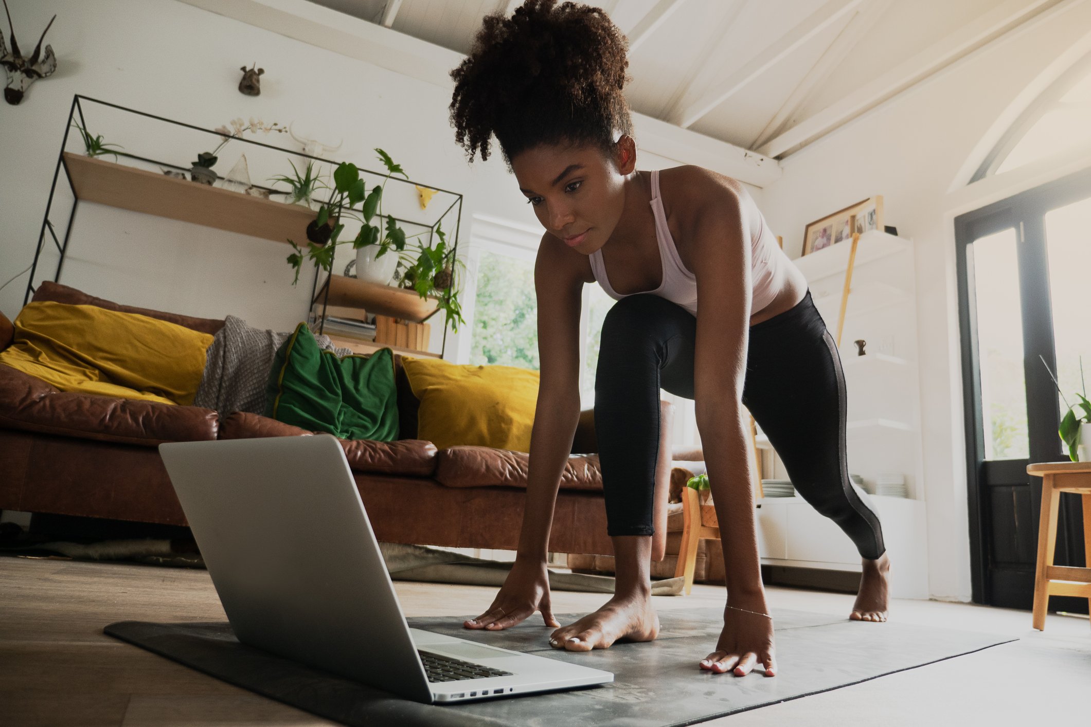 A woman exercising at home.