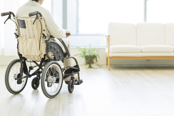 Senior lady in a wheelchair.