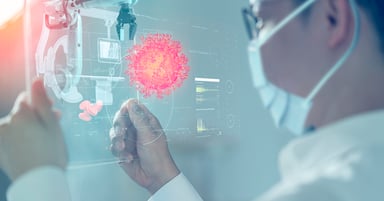 Scientist looking at coronavirus images