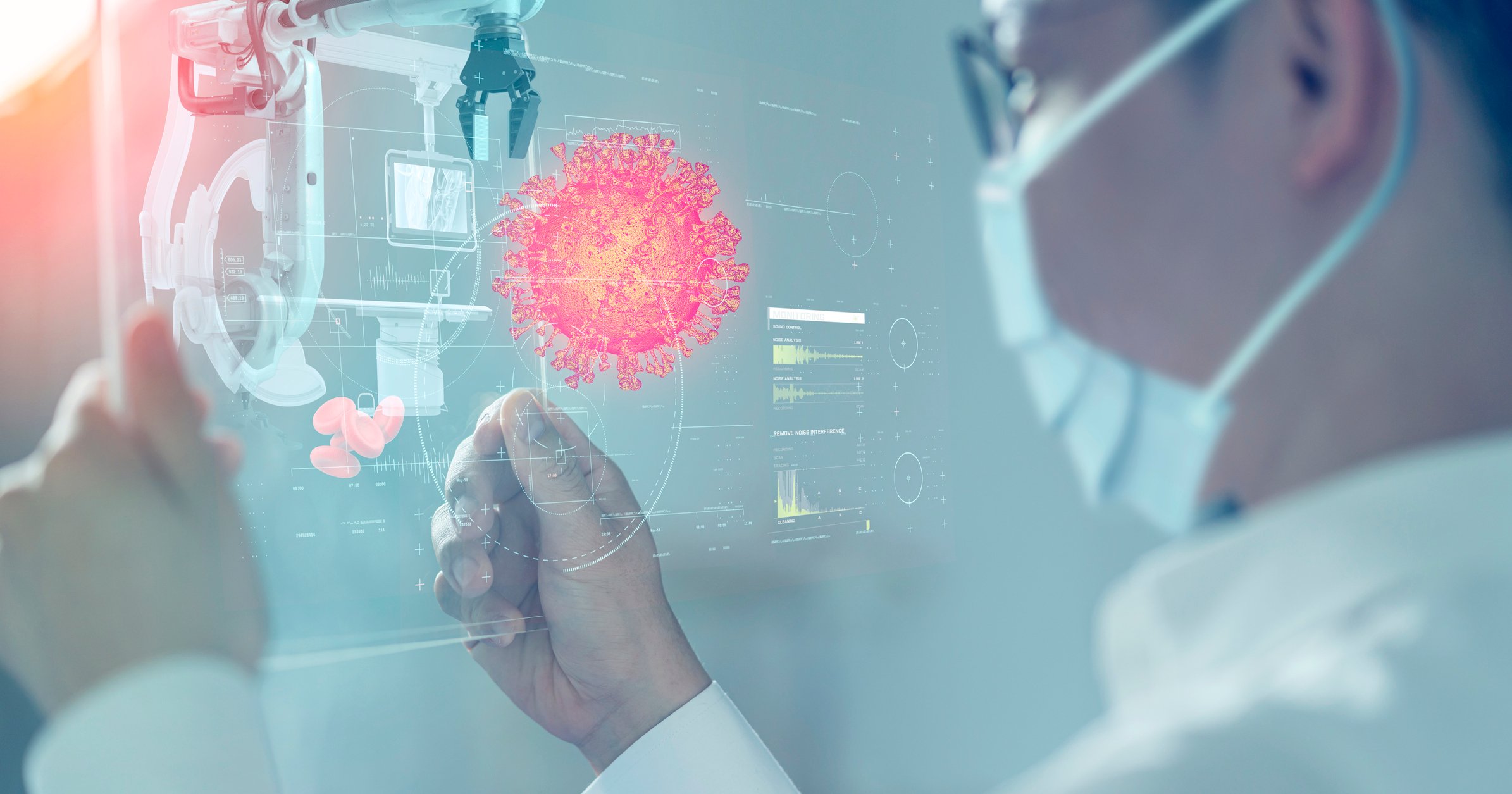 Scientist looking at a digital rendering of a coronavirus