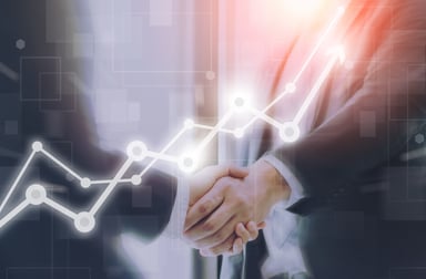 Shaking hands with stock chart