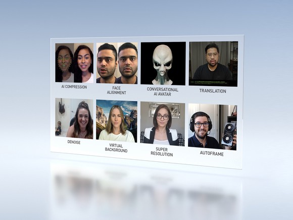 Video conference software displayed on a screen showing people's faces.