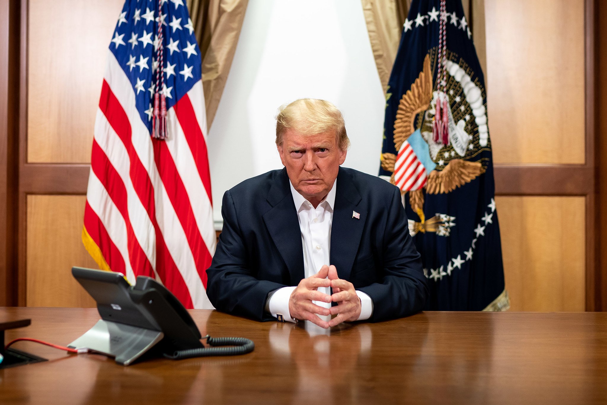 Donald Trump at a desk in Walter Reed Medical Center.