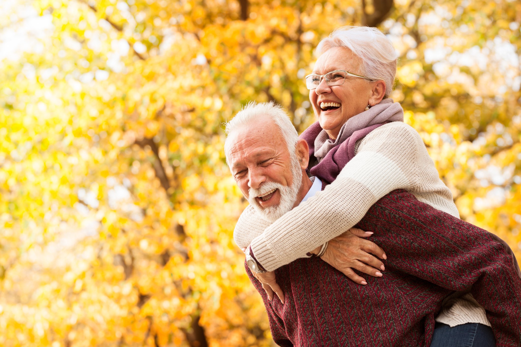 Senior couple walking in the park