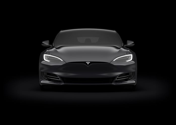 front view of a black Tesla car
