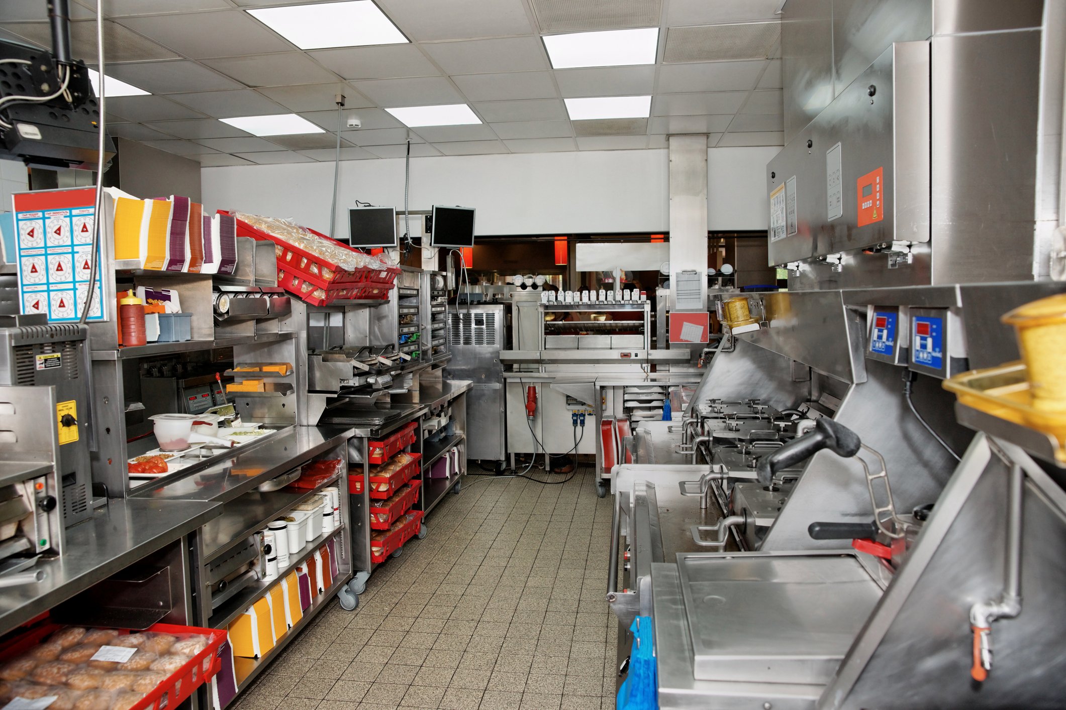 The inside of a fast-food restaurant kitchen.