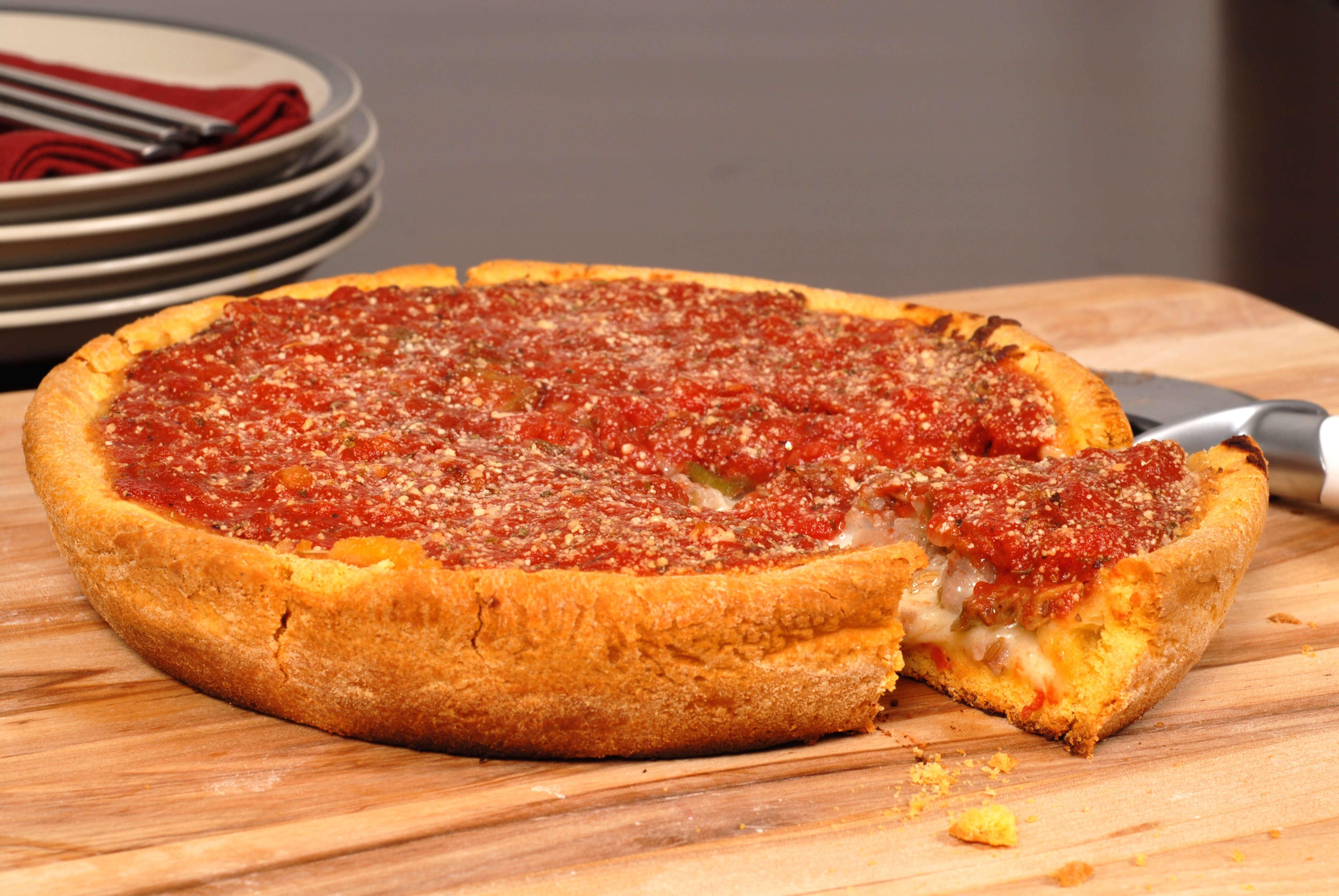 A deep dish pizza, similar to those sold at BJ's.