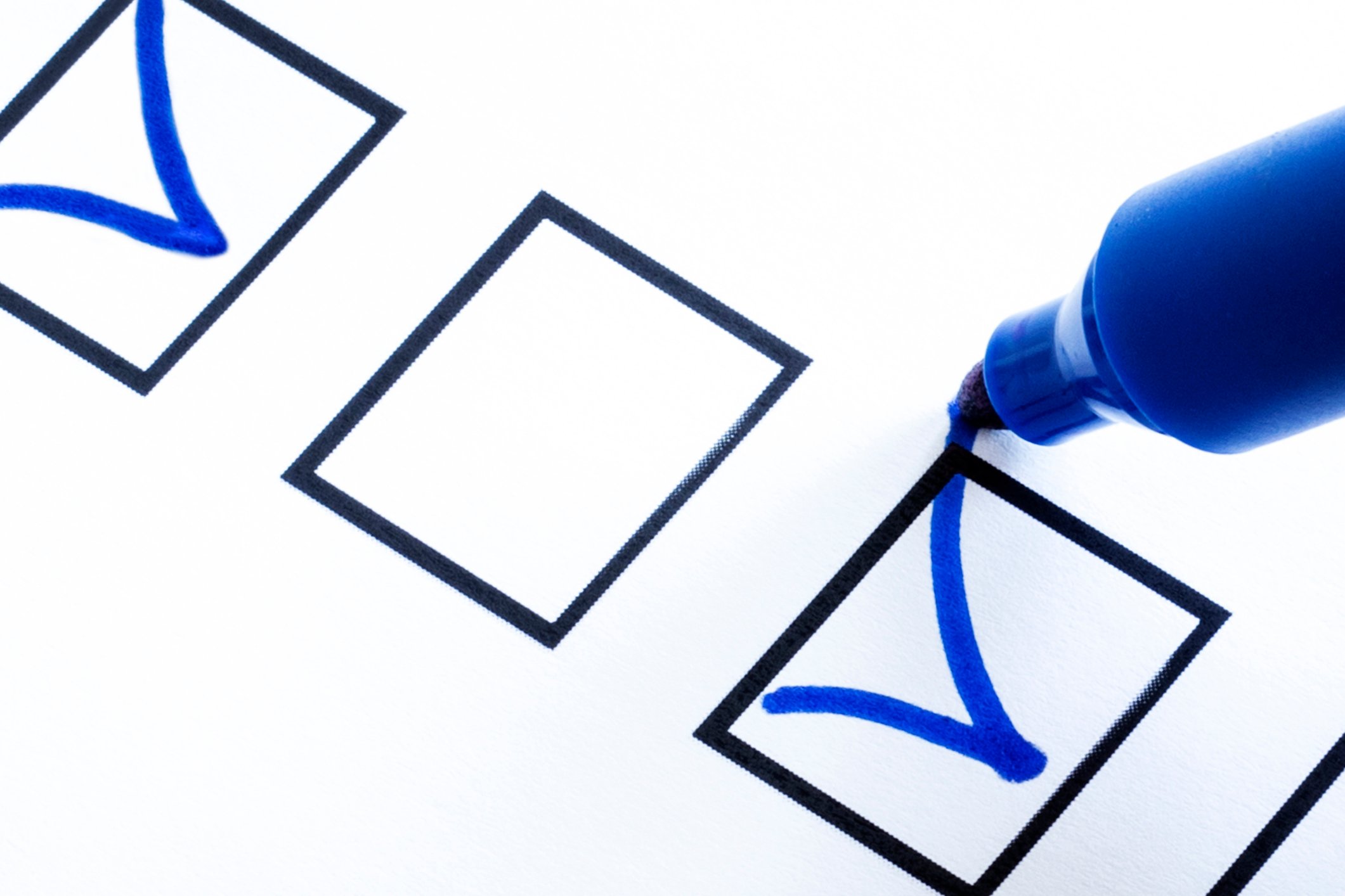 Three checkboxes, with the first containing a blue checkmark, and a blue marker making a checkmark in the third