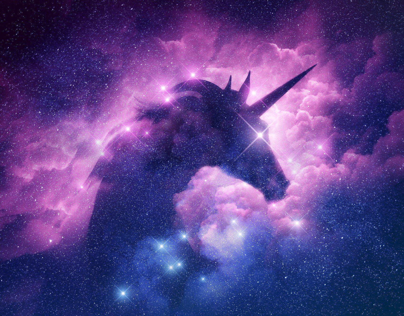 Unicorn silhouette set in a nebula cloud in space