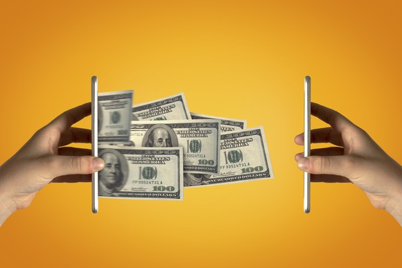 Money "leaping" from one smartphone to another.