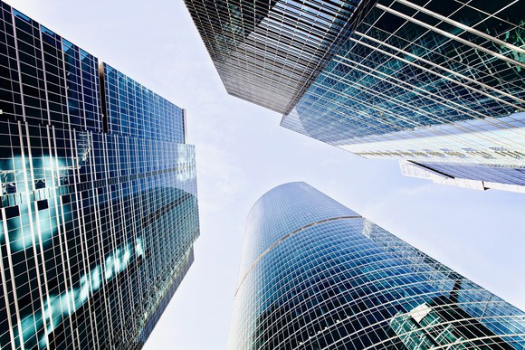 A group of skyscrapers, seen from below.