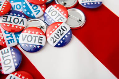 pile of voting buttons