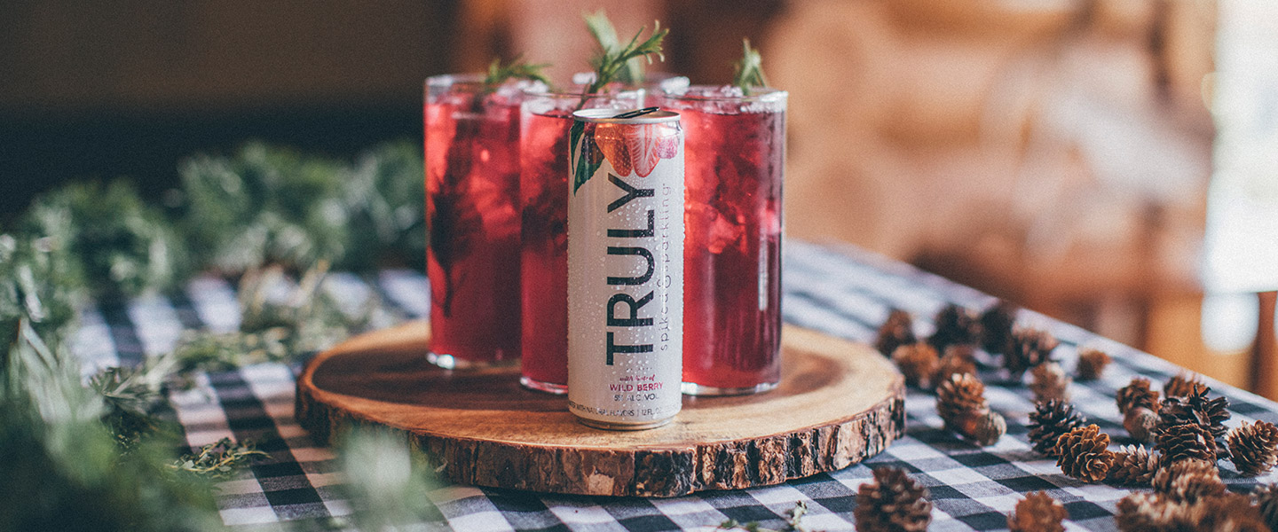 Truly hard seltzer on a wooden tray