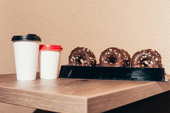Coffee and donuts from a restaurant.