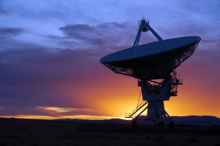 A giant satellite dish pointed to the sky.