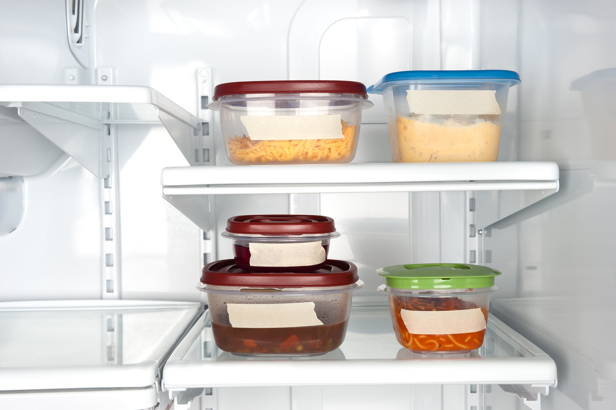 plastic food containers in a refrigerator