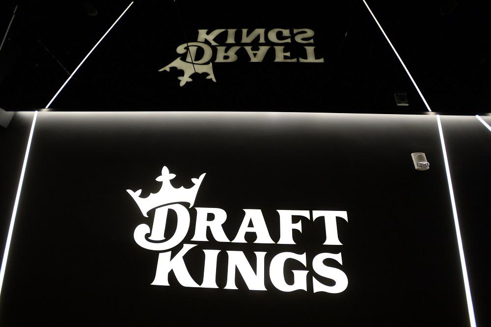 The DraftKings logo is displayed at the entrance  to its headquarters.