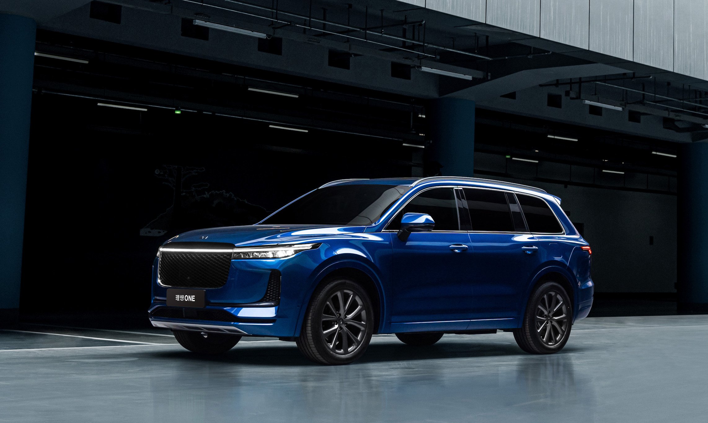 A blue Li ONE, a midsize electric SUV