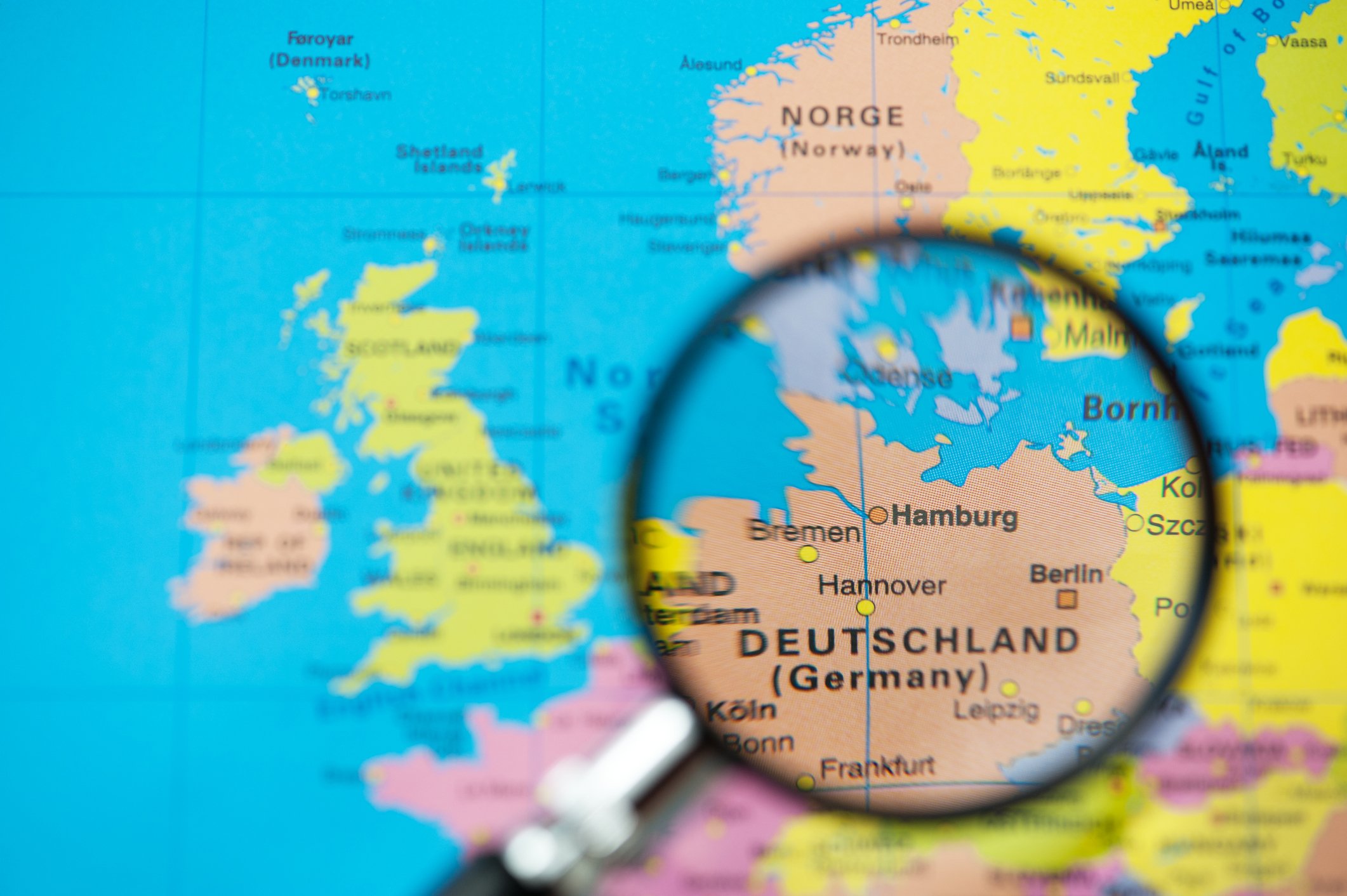 Magnifying glass over a map of Germany