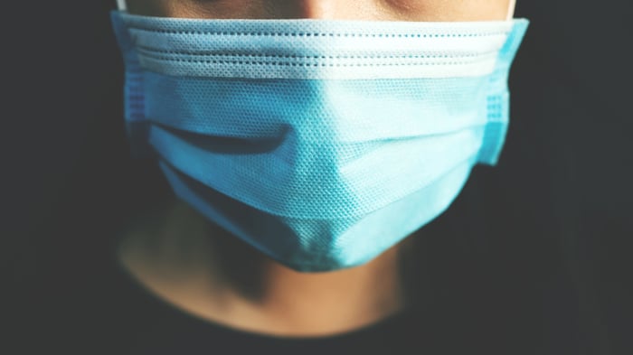 A person wearing a face mask.