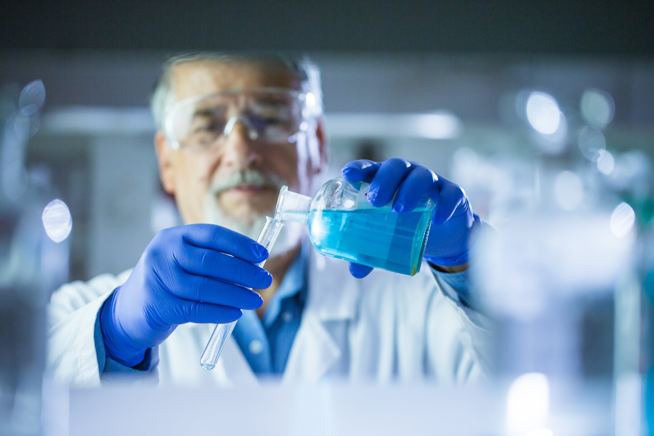 A man working in a research lab.