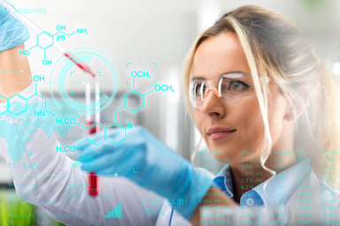 Scientist using a dropper to fill a vial