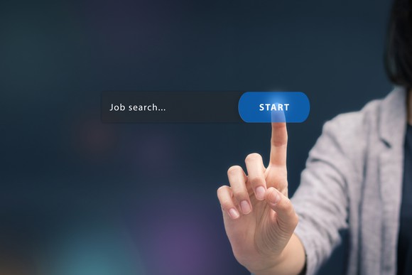 A person hitting a start button on a screen labeled Job Search