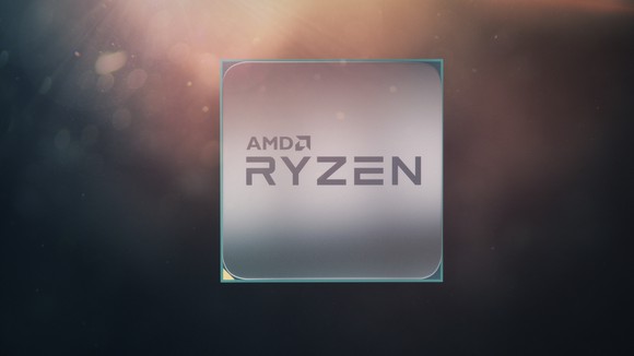 A central processing unit with the words AMD and Ryzen printed on the front.