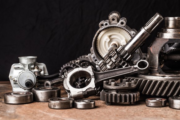A collection of different car parts on a counter