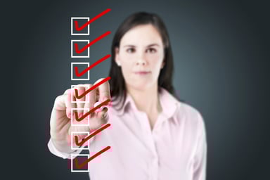 woman checking checklist