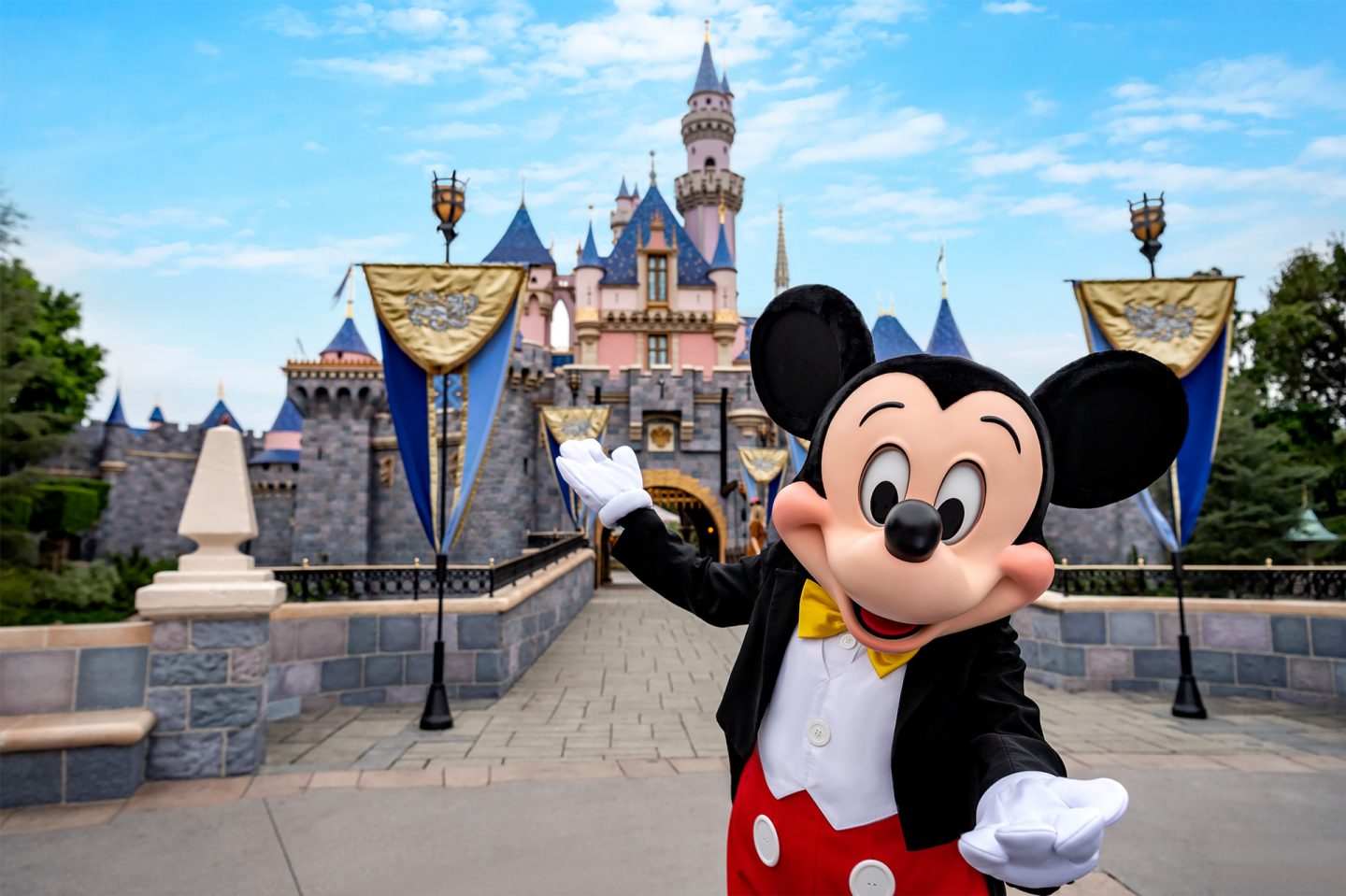 Mickey Mouse is welcoming guests to Disneyland.