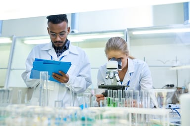 Male and female scientists working in a lab