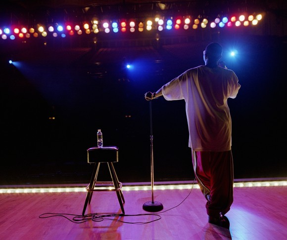 Person standing on stage