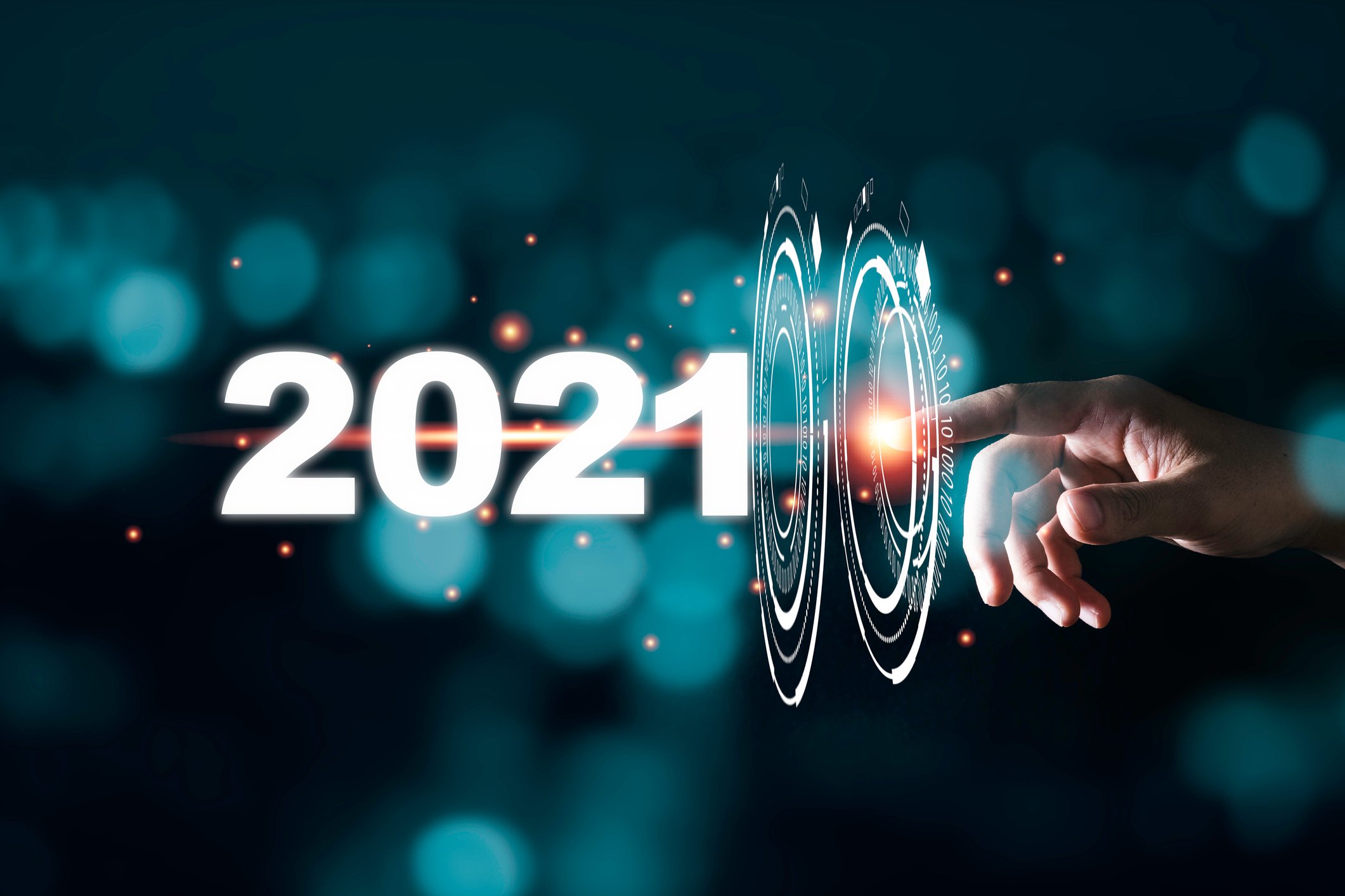 A finger touches the numbers 2021 with animations. 