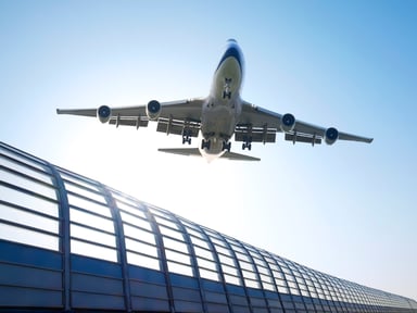 Jet flying over airport