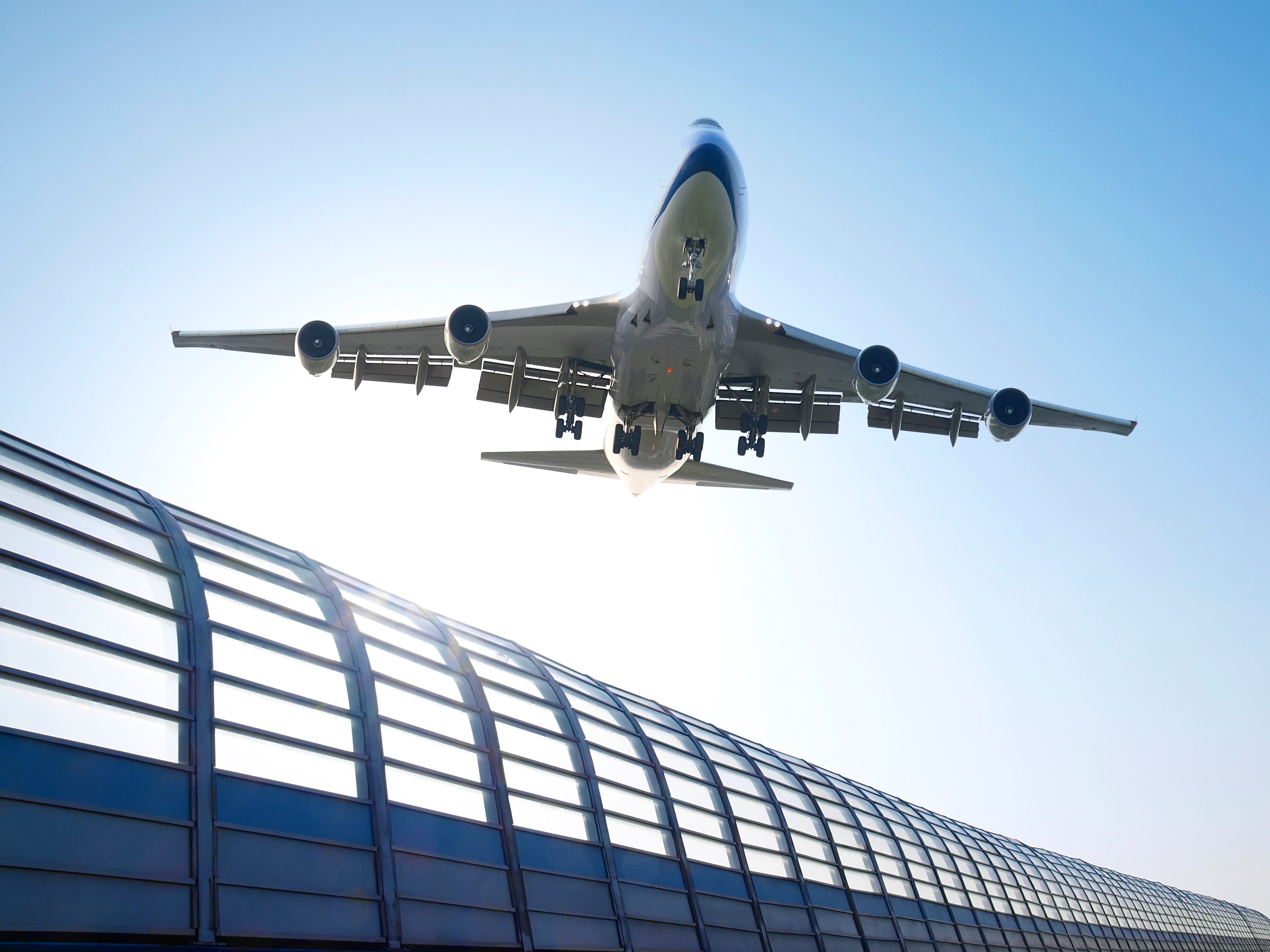 Jet flying over airport