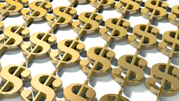 Lots of gold dollar signs line up next to each other