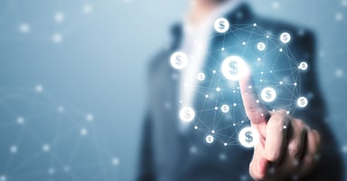 Man pointing to digital dollar signs