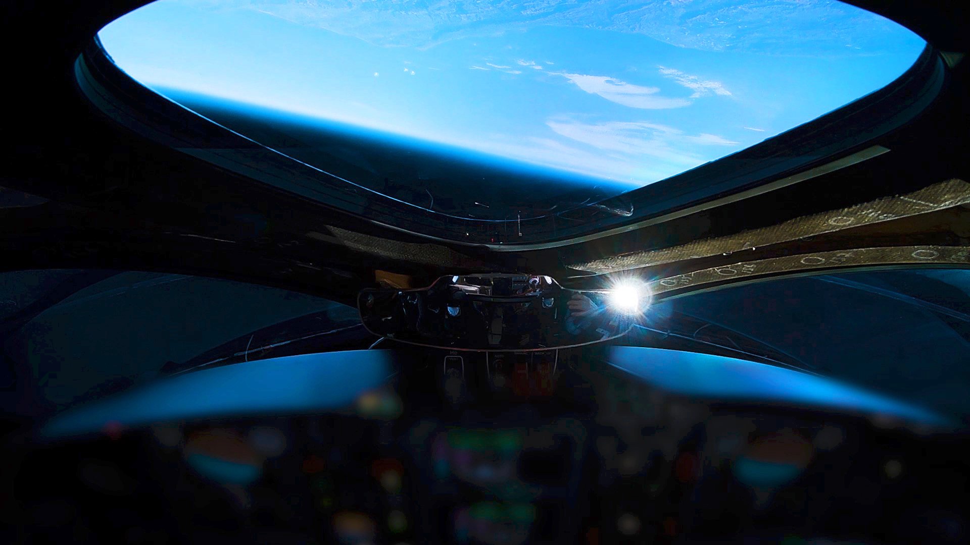 Space as viewed from Virgin Galactic ship cockpit.