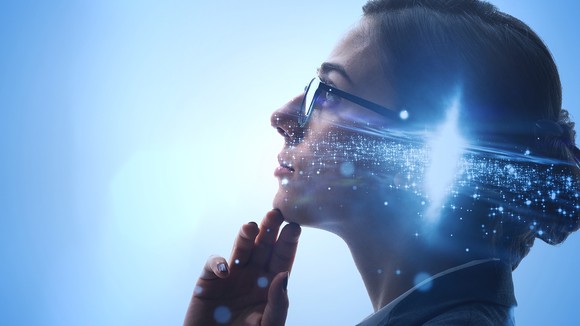 Thoughtful-looking woman with light around head 